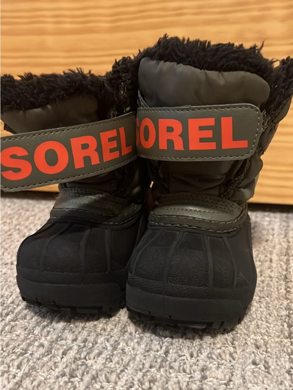 Sorel Kids Olive Green and Black Boots with Orange Logo